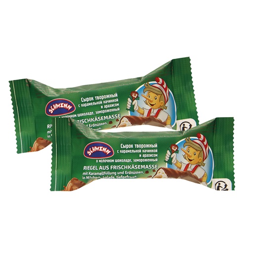Reep van roomkaasmassa met karamelvulling en pinda's, in melkchocolade, diepgevroren