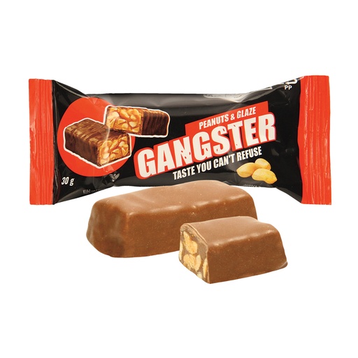 Карамельный батончик с жареным арахисом в кондитерской глазу